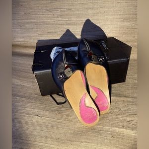 Leather and wood clogs, from Irregular Choice.